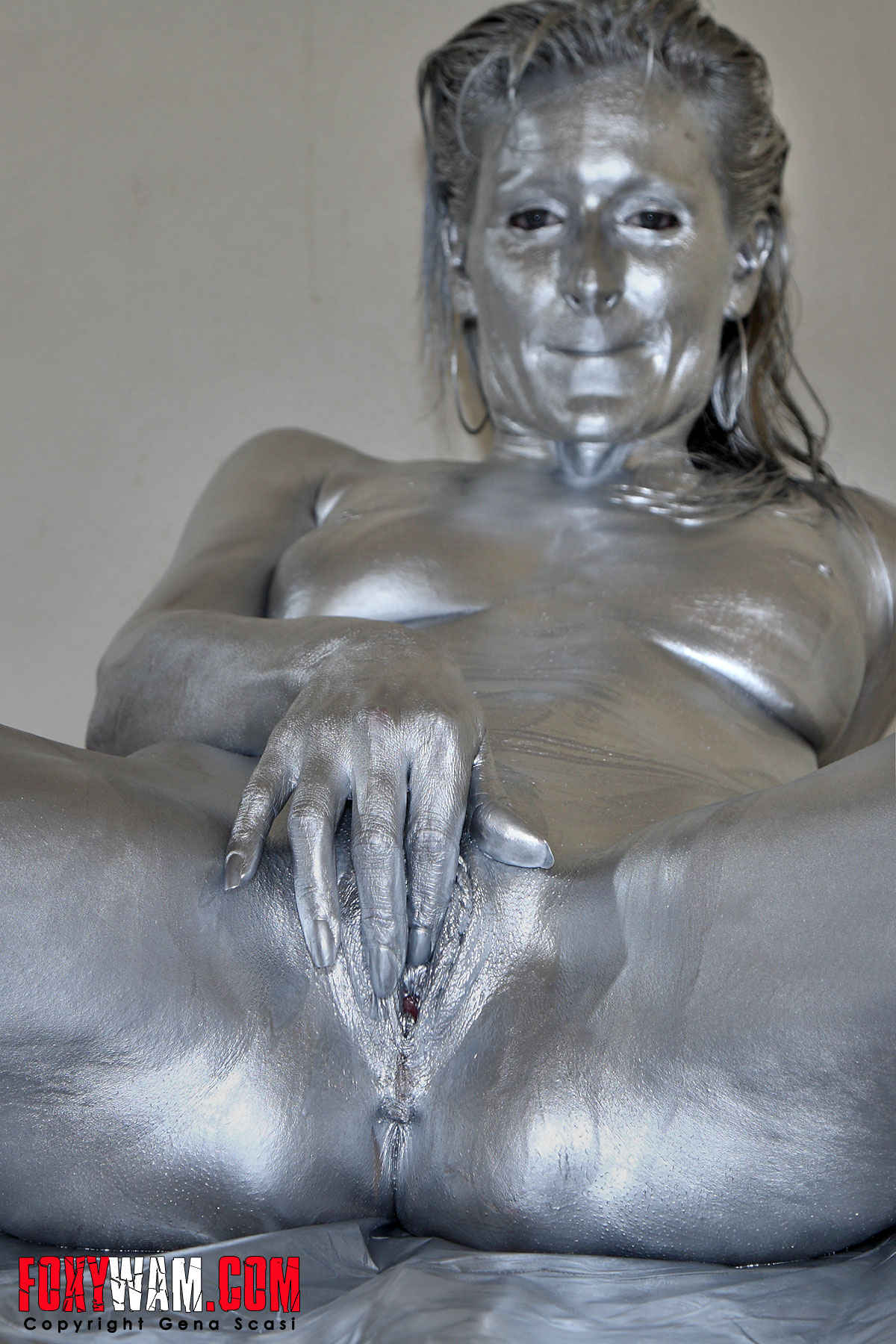 Nude and overed silver metallic paint.